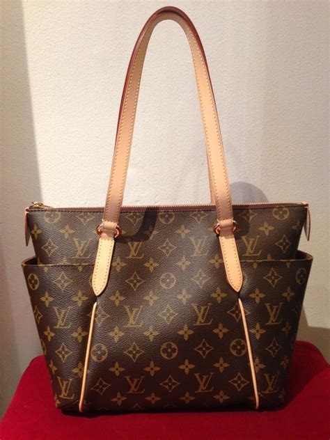 märkesväskor louis vuitton|farfetch louis vuitton väska.